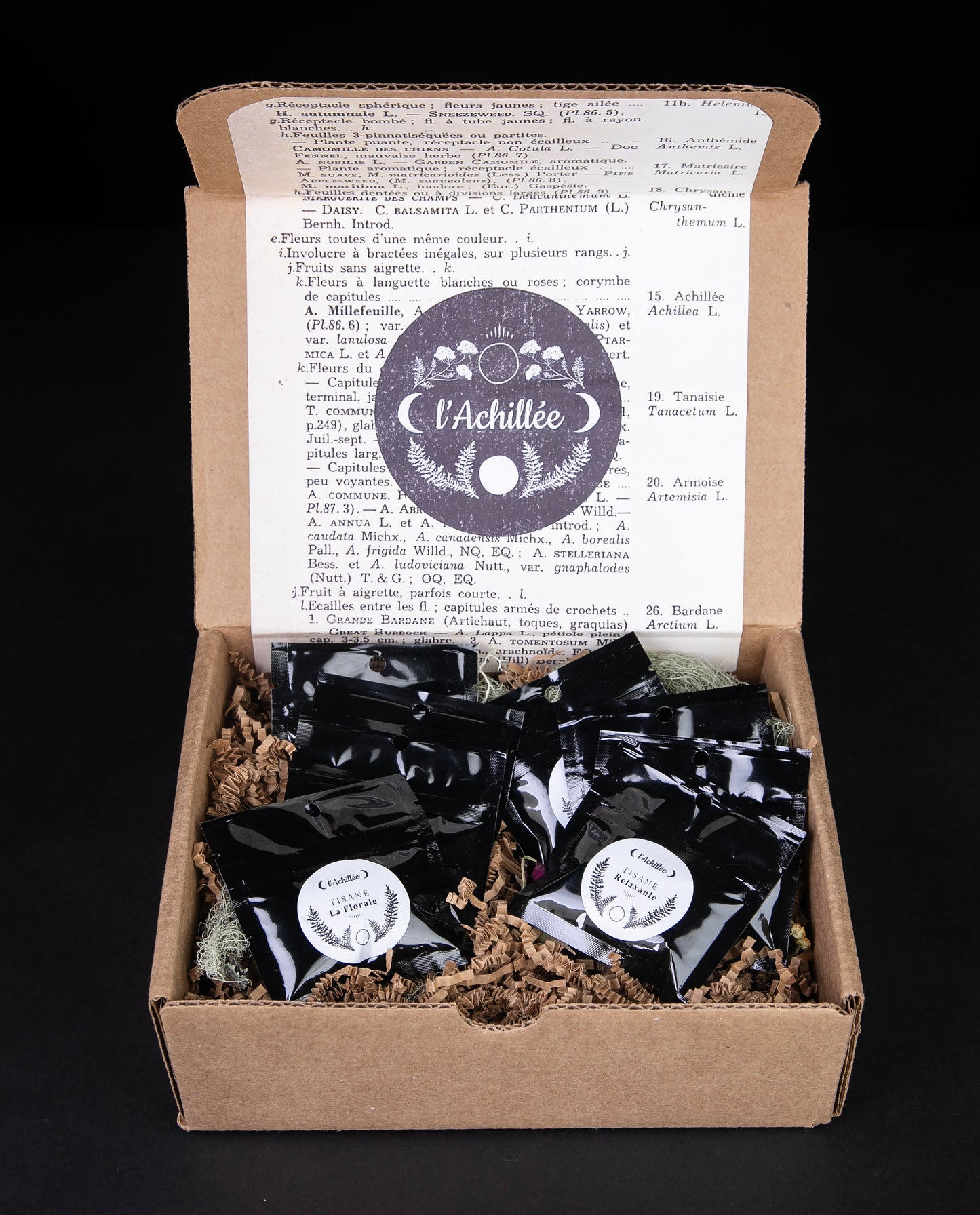 open l'Achillée tea tasting giftbox, revealing 8 small tea sample bags