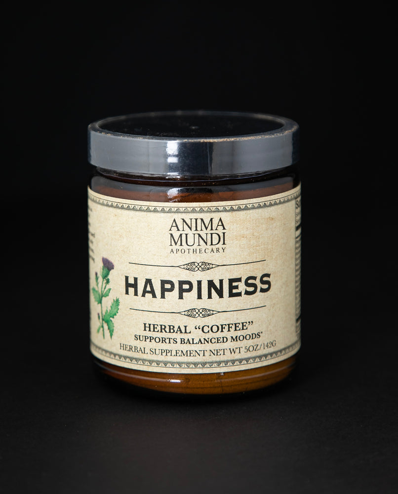 Amber glass jar with tan label reading 'Happiness Herbal "Coffee". It contains a herbal supplement by Anima Mundi.