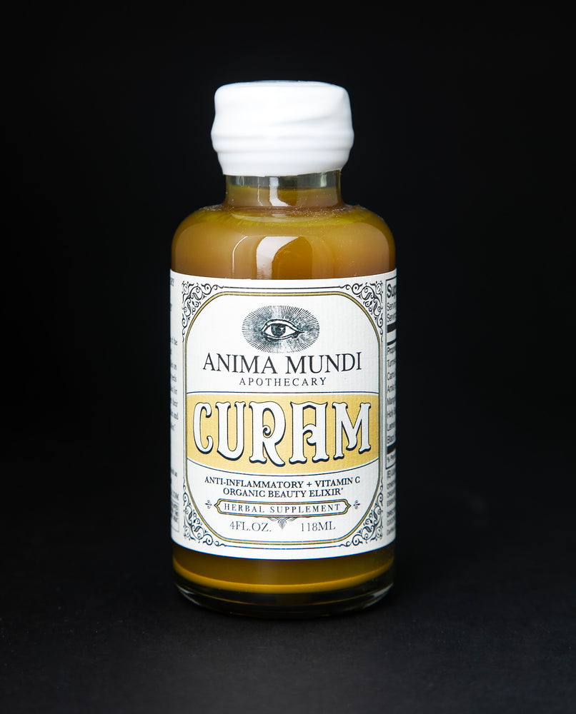 4oz clear glass bottle of Anima Mundi's "Curam" elixir on black background. The liquid in the bottle is of a rich turmeric gold colour.