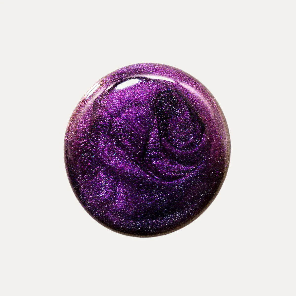 Swatch of "Bat out of Hell" nailpolish on white background. The polish is a multichrome purple colour.