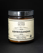40z amber glass jar with black lid and tan label on black background. The jar contains Anima Mundi's ashwagandha powder. The label reads "Nature's Chill Pill".