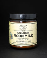 Amber glass jar with black lid and tan label. The jar contains Anima Mundi's "Golden Moon Milk" herbal supplement.