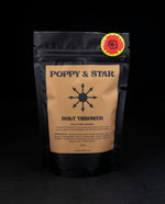 3.5oz black resealable bag of Poppy & Star's "Bolt Thrower" herbal coffee substitute on black background.