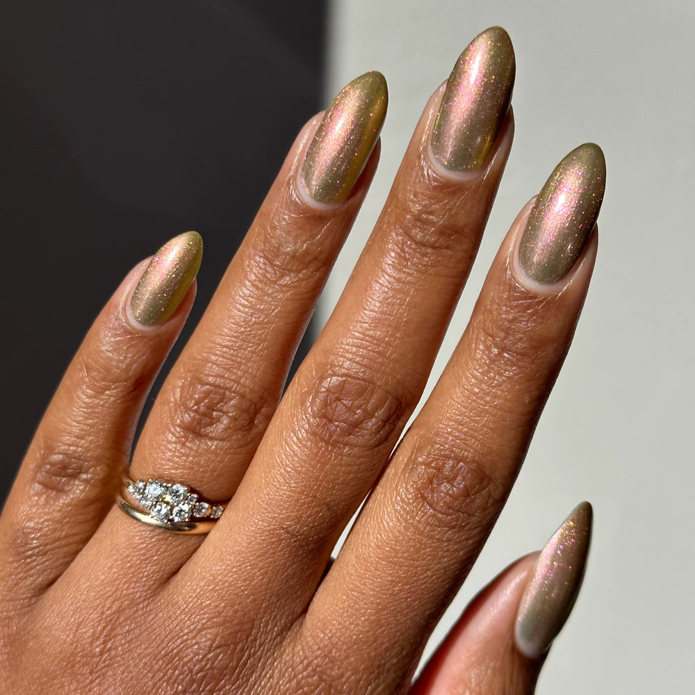 
                      
                        "Eating heads" nail polish shown on model
                      
                    