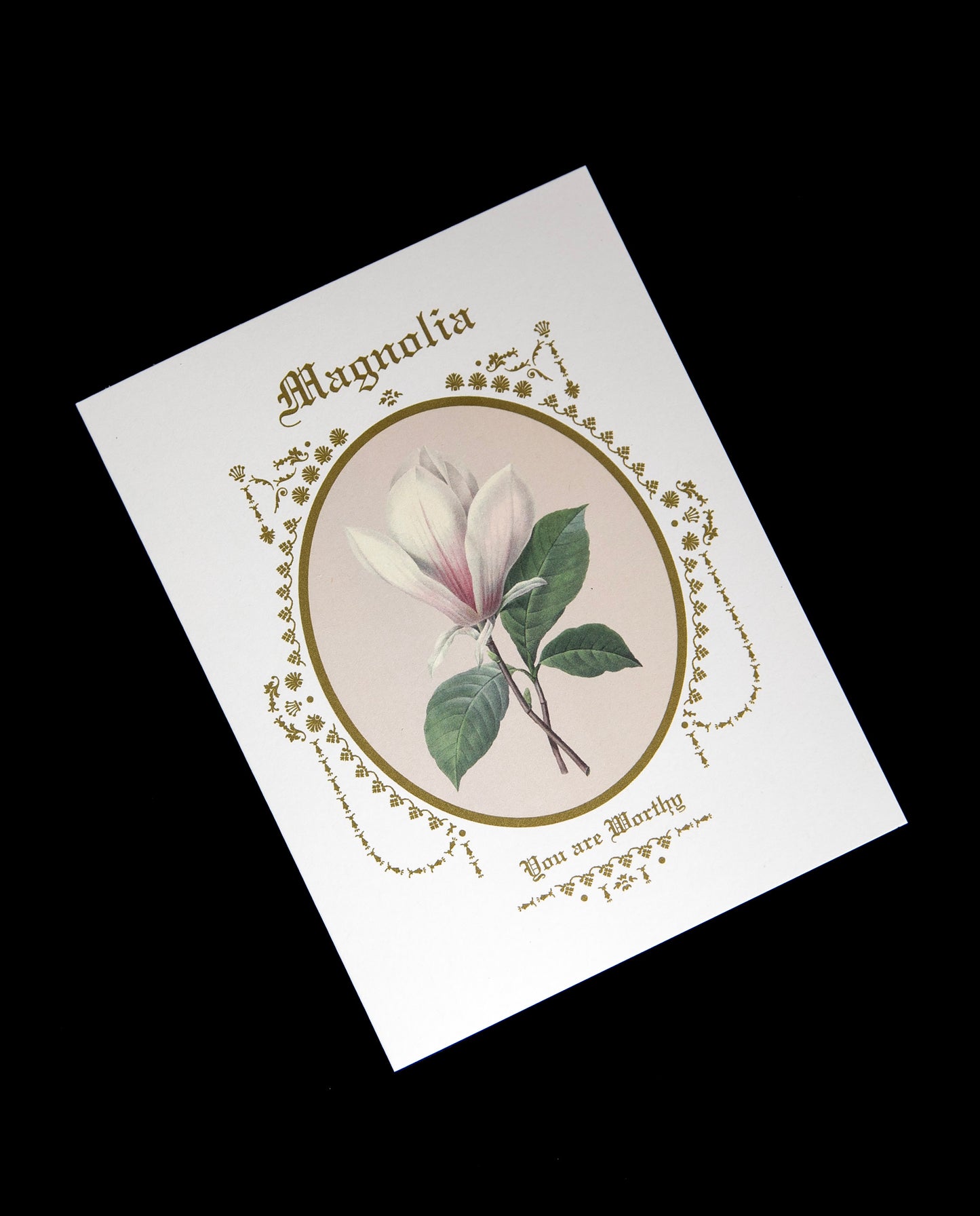 white card featuring an illustration of a magnolia in a gilded frame