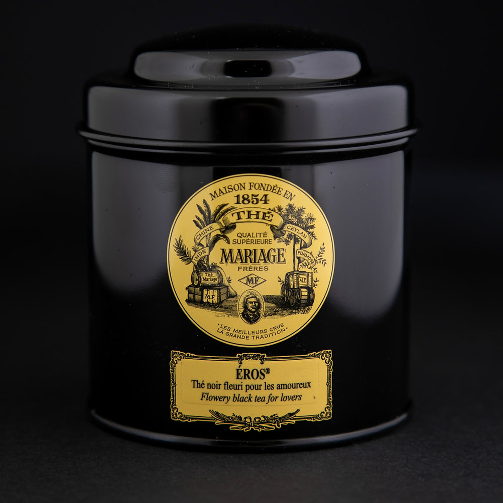 100g black laquered metal canister of Mariage Frère's "Eros" tea blend on black background.