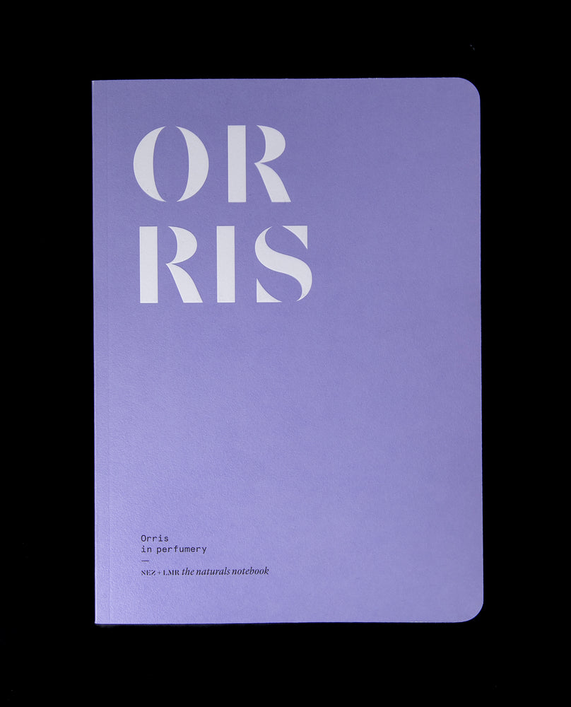 The book "Orris in Perfumery" on black background. The cover is lavender coloured and reads "ORRIS" in bold white graphic letters.