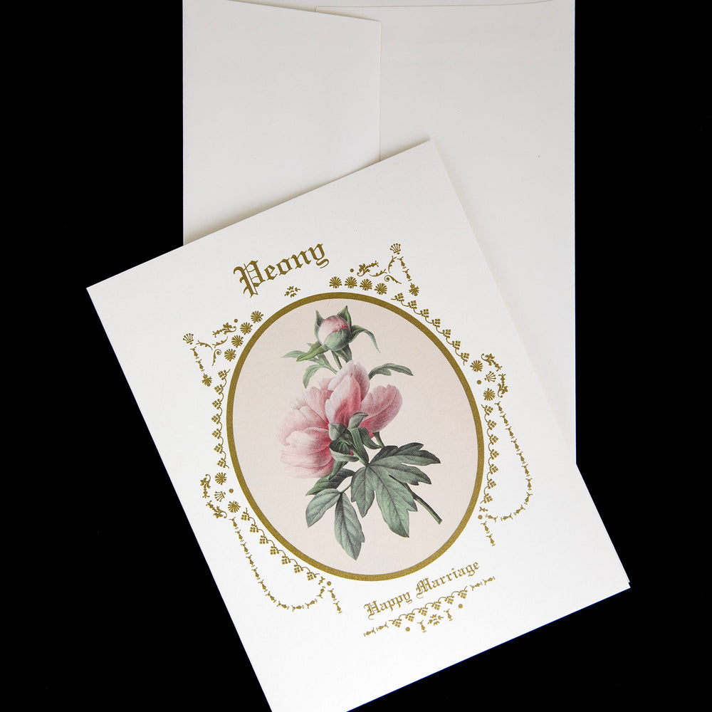 peony greeting card sitting atop its envelope against a black background