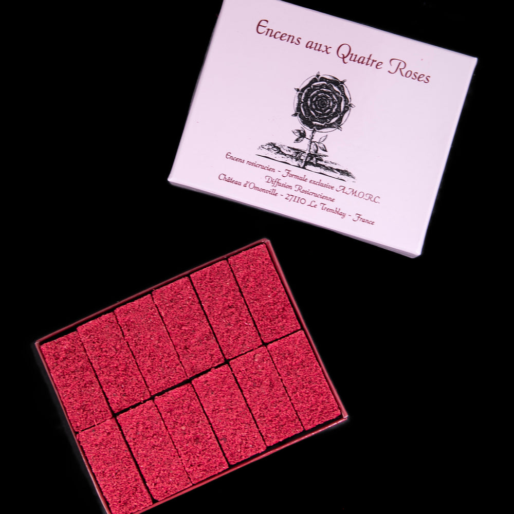 Open box revealing 12 tighly packed bricks of "Quatre Roses" incense