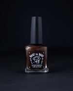 "Reishi" nail polish by Death Valley Nails. The polish is a rich brown colour.