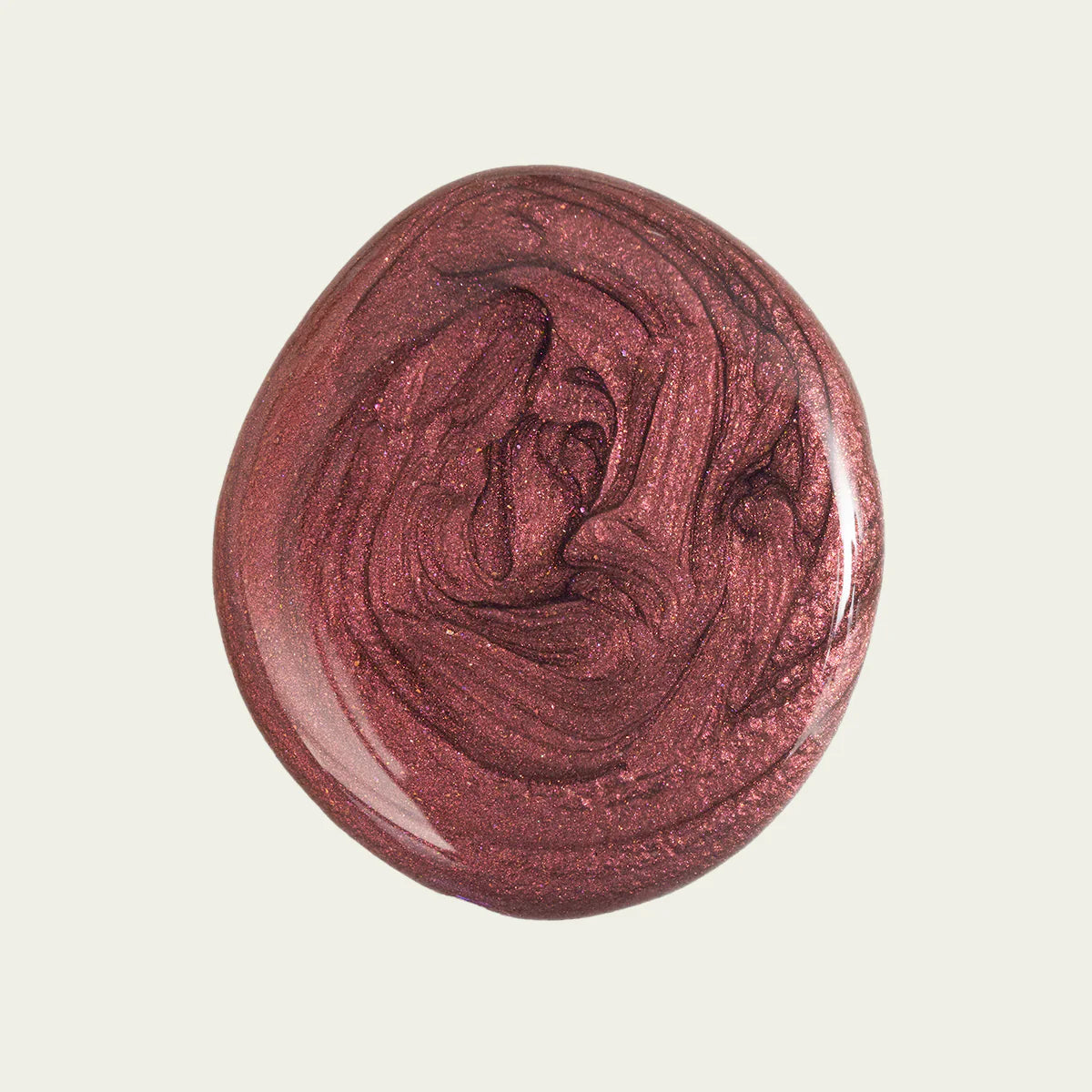 swatch of pinkish copper shimmer polish on white background
