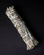 large bundle of dried mugwort wrapped in white string