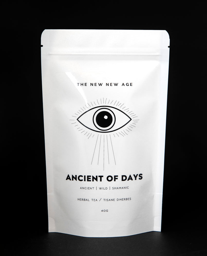 White 40g resealable bag of The New New Age's "Ancient of Days" tea blend. There is a simple black illustration of an eye on the bag.