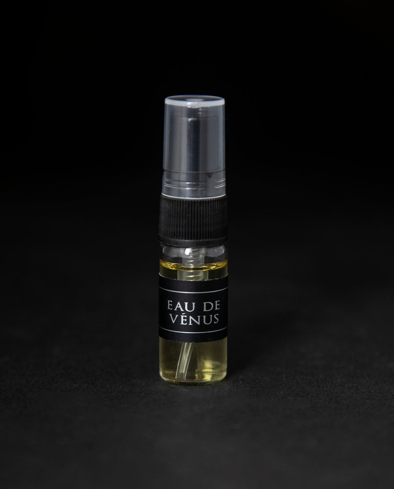 3ml glass sample spray bottle of LVNEA's Eau de Venus natural fragrance on black background
