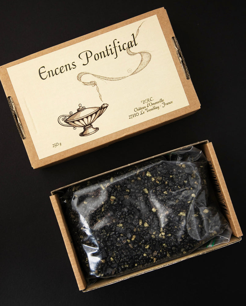 Opened box of Pontifical Incense, revealing a bag filled with the loose resin incense.