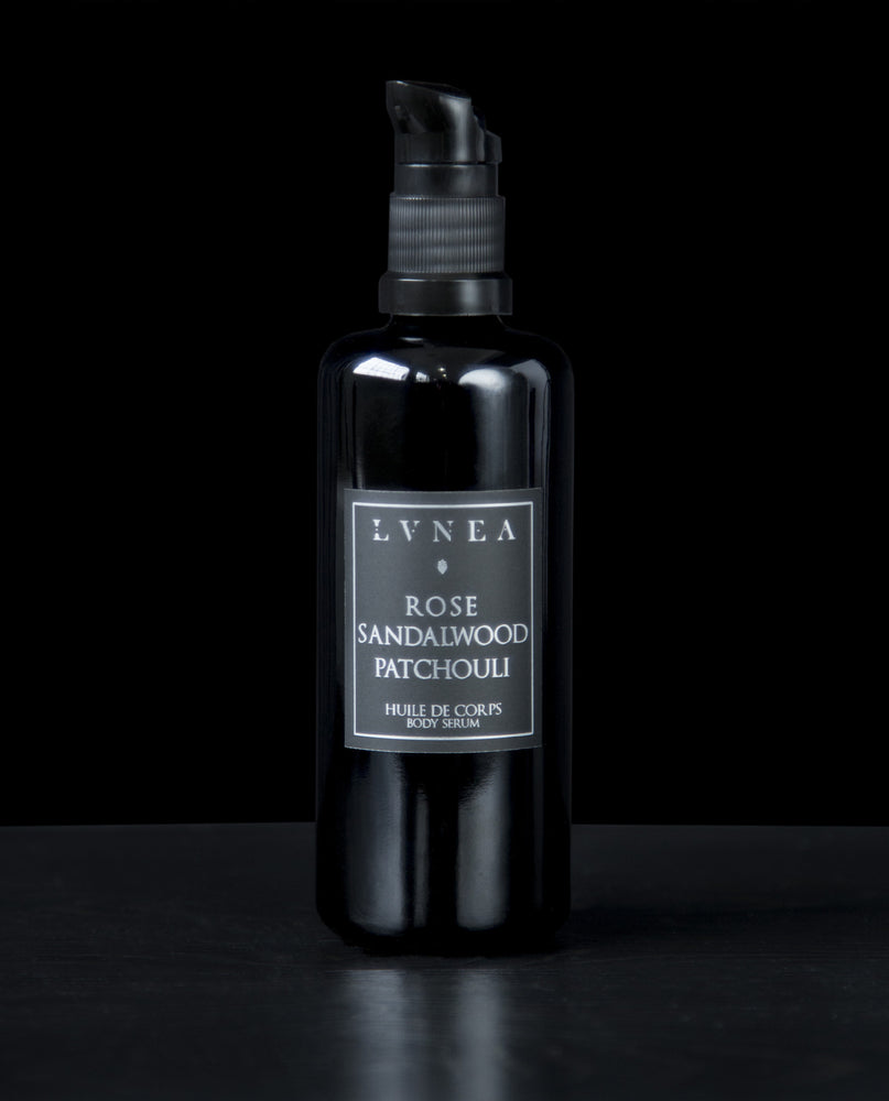 100ml black glass bottle with pump dispenser of LVNEA’s Rose, Sandalwood and Patchouli body serum