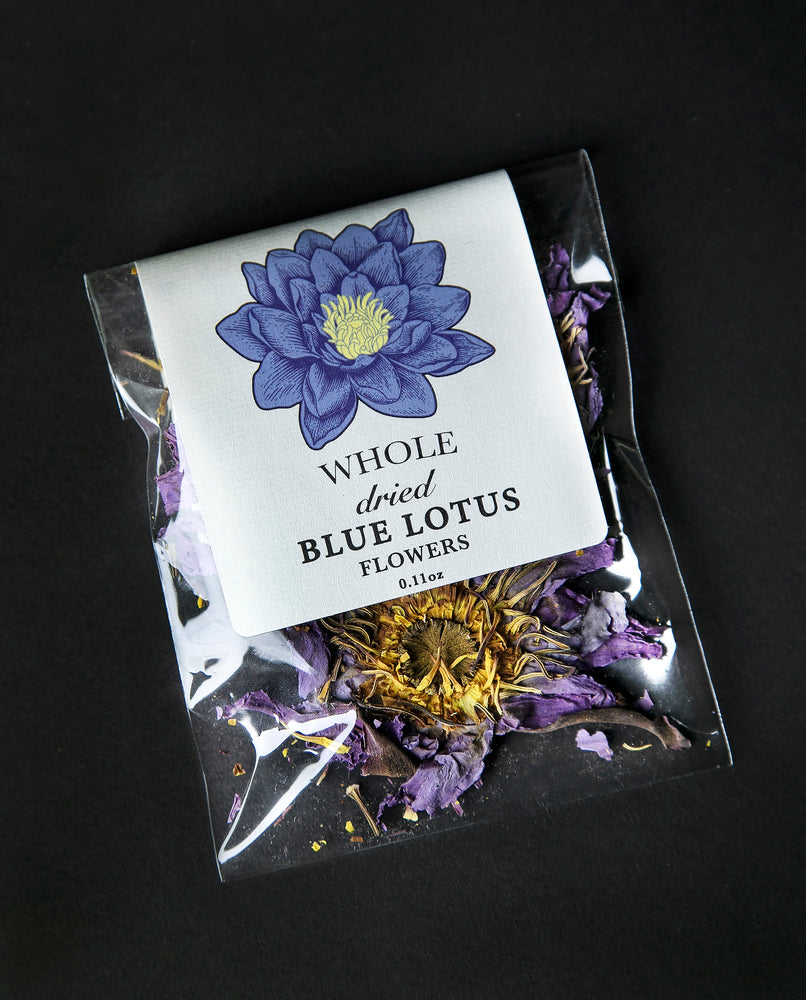 Whole blue lotus flowers in a clear plastic pouch.