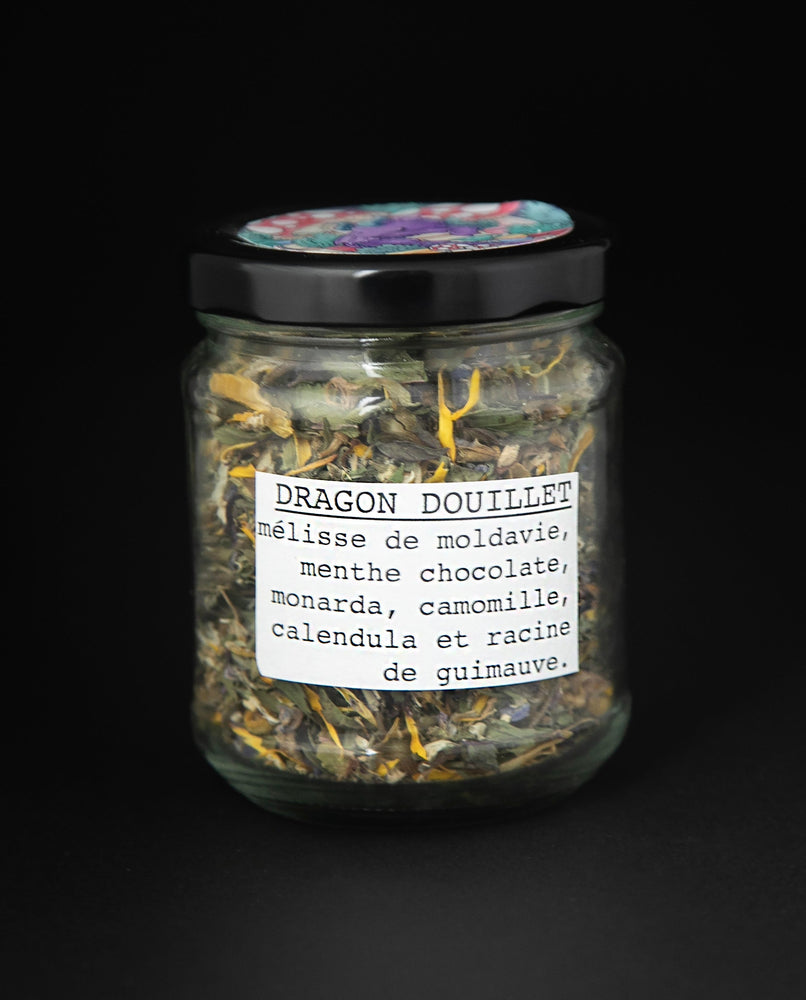 jar of herbal tea blend, showing french label which reads "Dragon Douillet" 