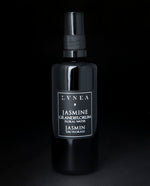 100ml black glass bottle of LVNEA's Jasmine Hydrosol on black background