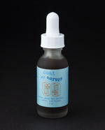 1oz clear frosted glass bottle with sky blue label reading "coat my nerves". The bottle contains a herbal tincture by 69herbs.