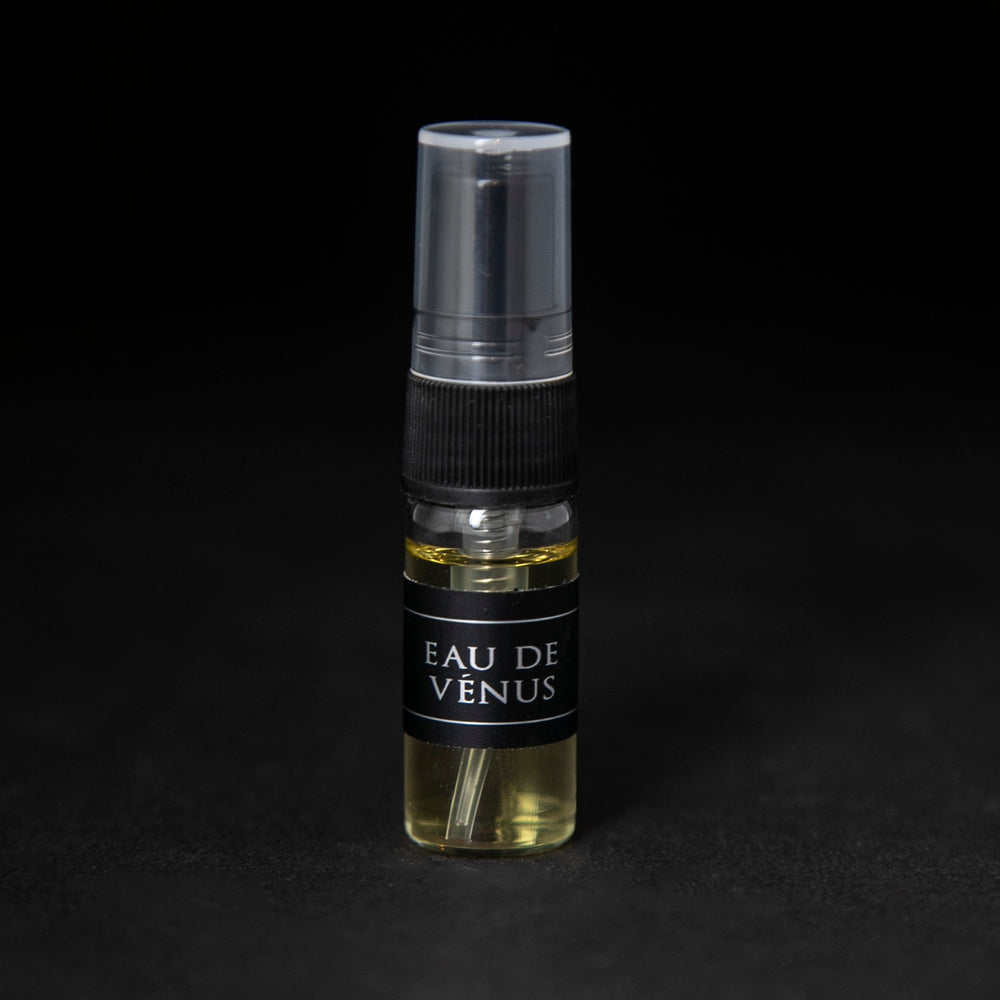 3ml glass sample spray bottle of LVNEA's Eau de Venus natural fragrance on black background