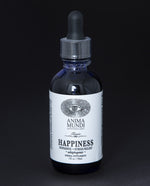 Black 2oz glass bottle with black dropper top and white label reading "Happiness Dopamine + Stress Relief". The bottle contains a herbal tincture by Anima Mundi.