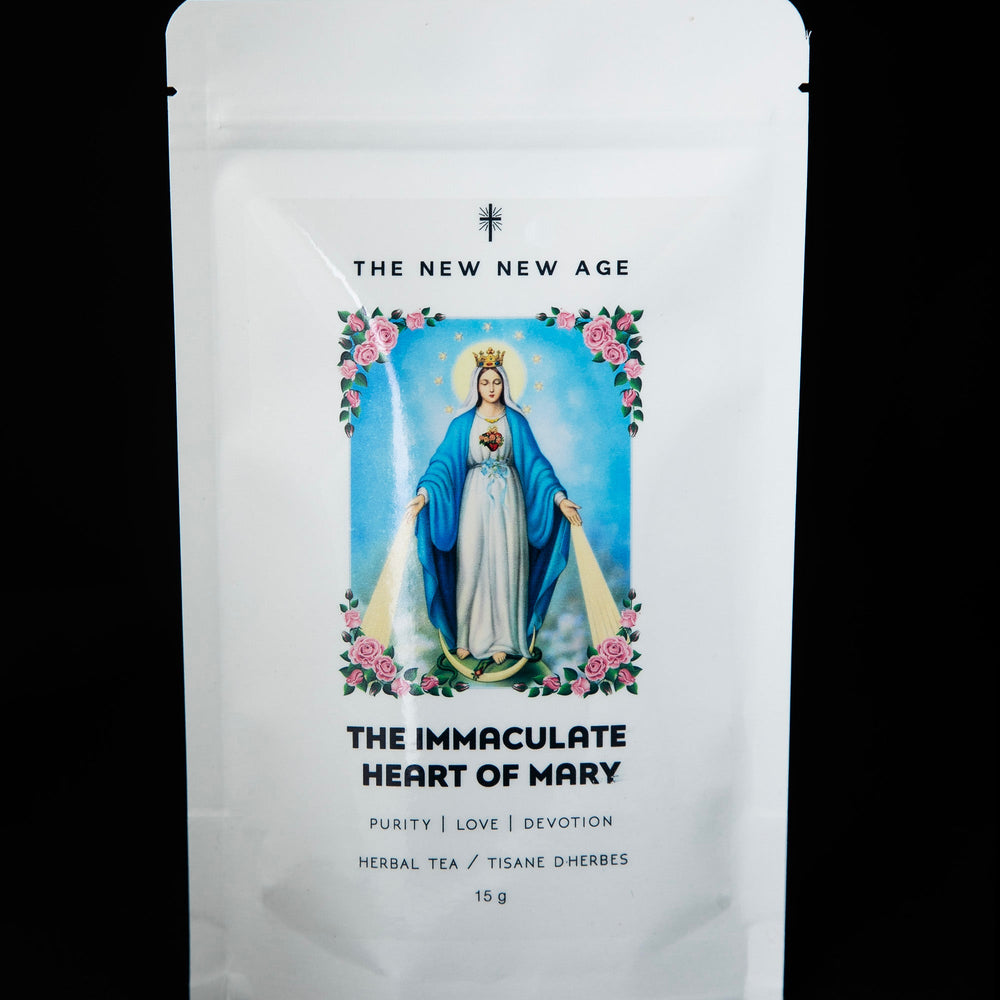 Resealable white pouch of The New New Age's "The Immaculate Heart of Mary" herbal tea. There is an image of Mother Mary surrounded by roses on the front of the bag.