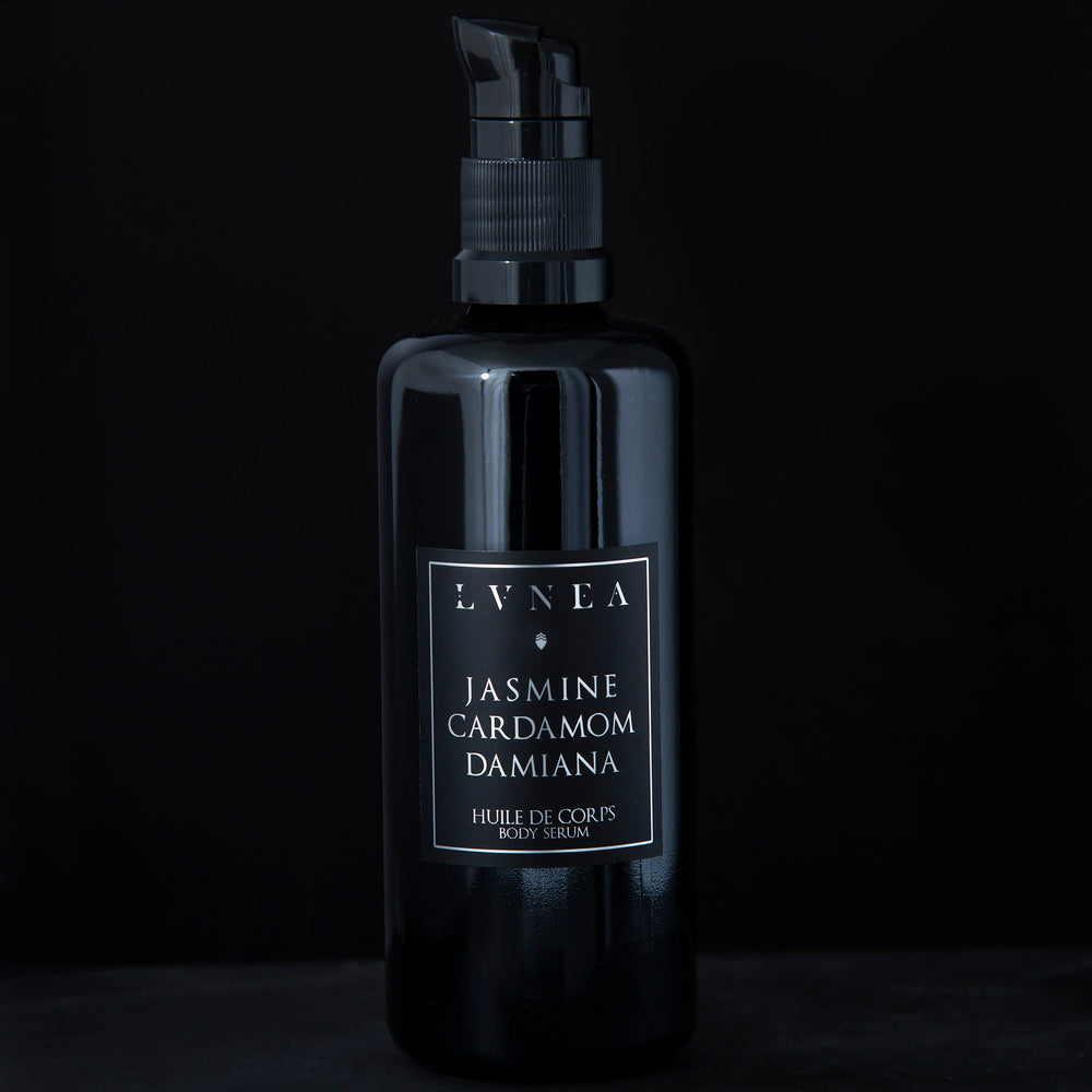 100ml black glass bottle with pump dispenser of LVNEA’s Jasmine, Cardamom and Damiana body serum