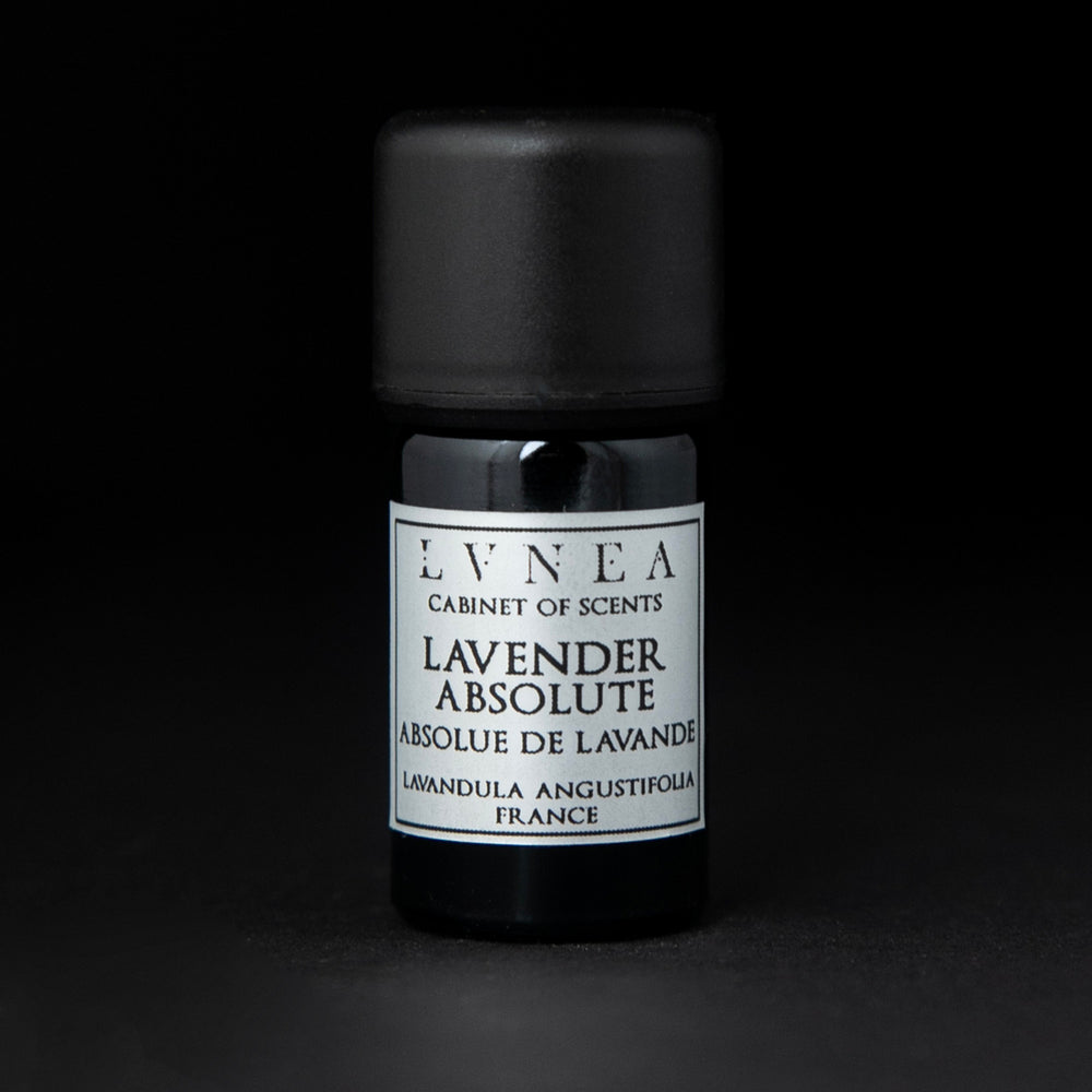
                      
                        5ml black glass bottle of LVNEA's lavender absolute on black background. The label on the bottle is silver.
                      
                    