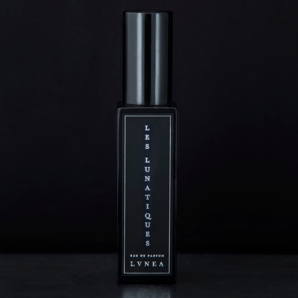 
                      
                        30ml black glass bottle of LVNEA’s Les Lunatiques natural perfume on black background
                      
                    