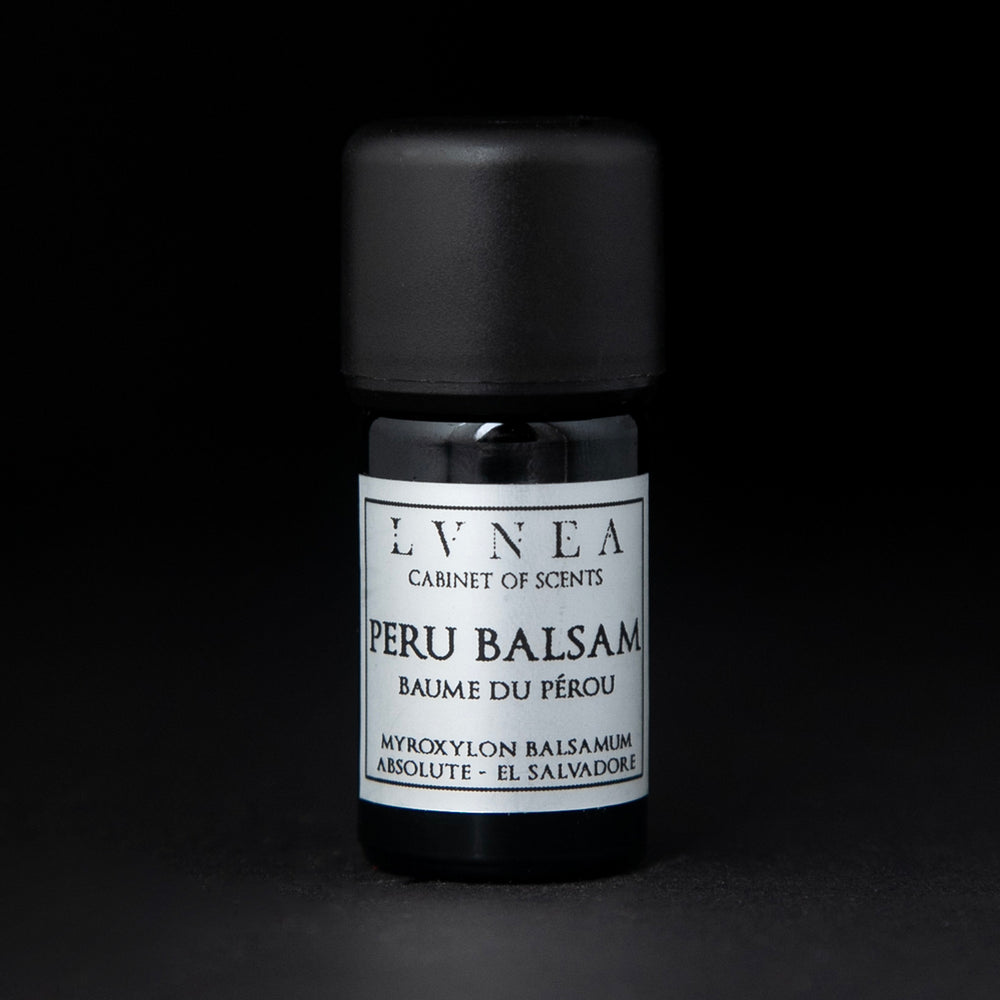 5ml black glass bottle of LVNEA's peru balsam absolute on black background. The label on the bottle is silver.