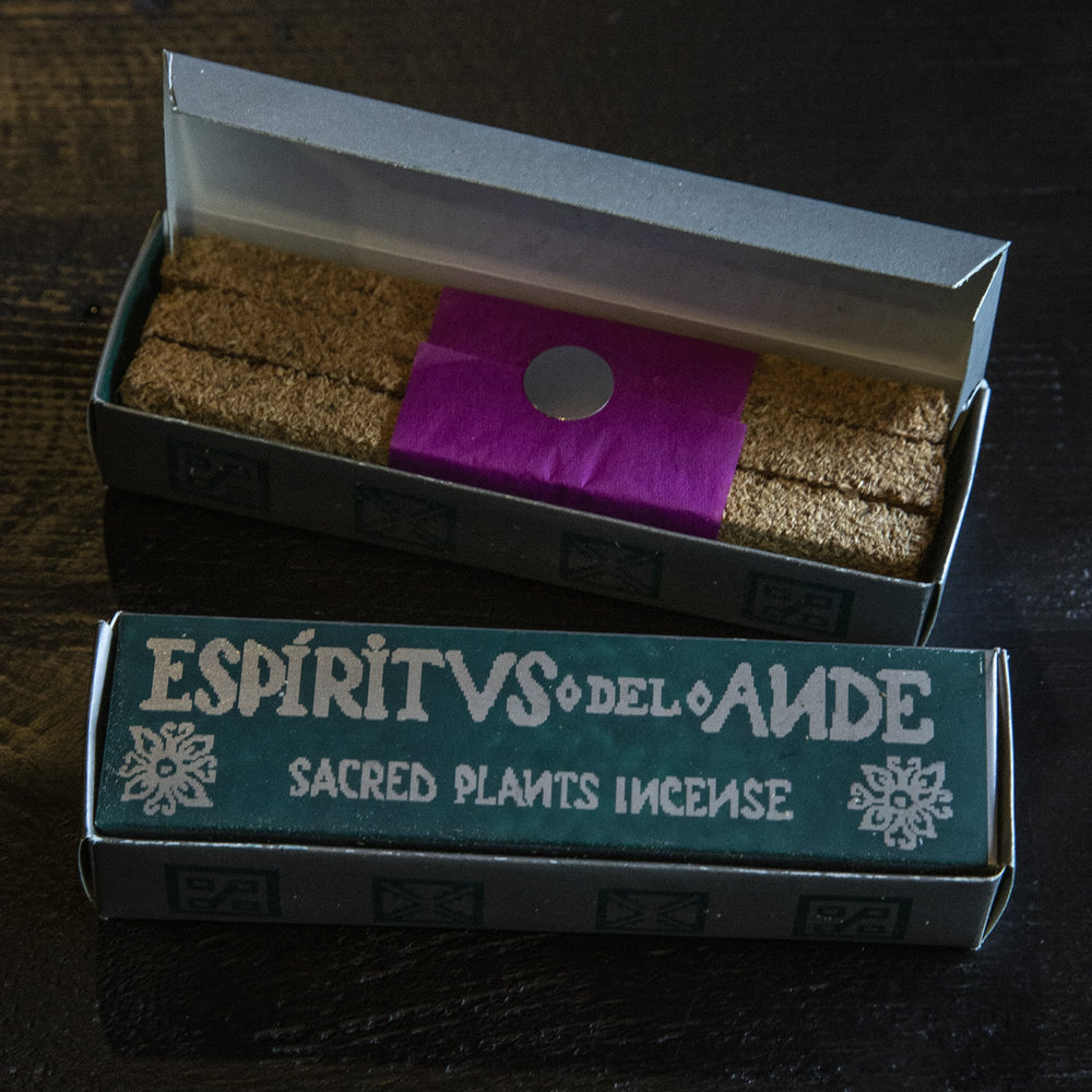 
                      
                        Open box of Incausa's Rosemary "Espiritvs" incense on dark wooden background
                      
                    