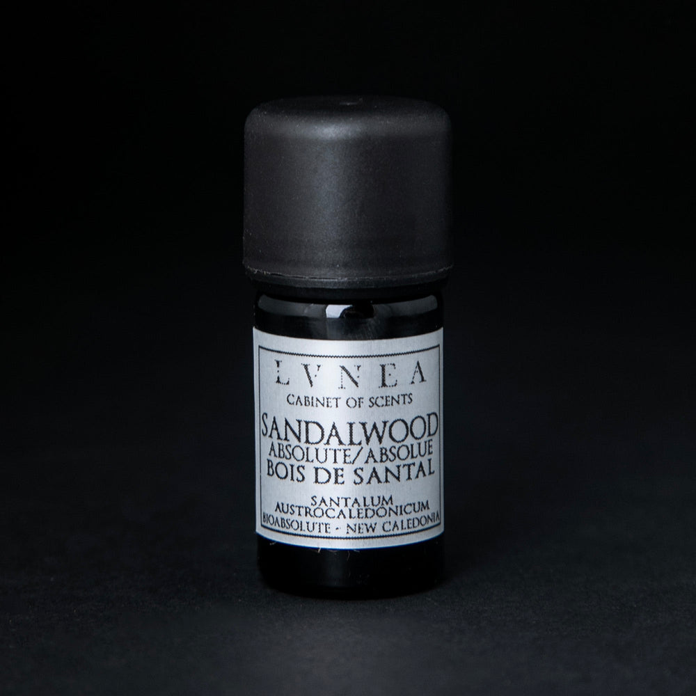 
                      
                        5ml black glass botttle of LVNEA's sandalwood bioabsolute on black background. The label on the bottle is silver.
                      
                    