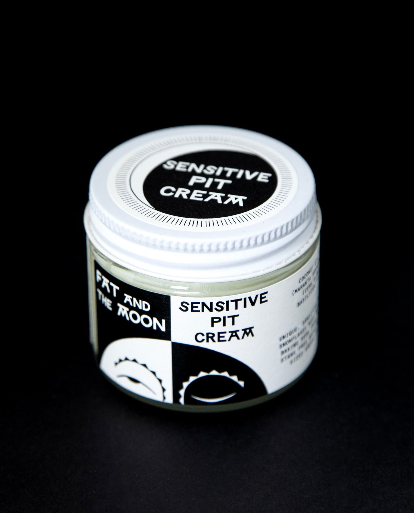 clear glass pot of Fat and the Moon's "Sensitive Pit Cream" deodorant