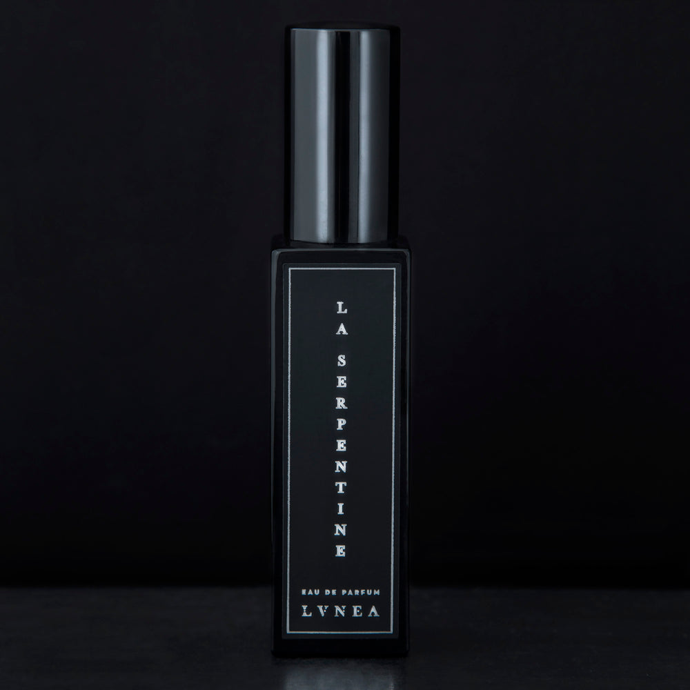 
                      
                        30ml black glass bottle of LVNEA’s La Serpentine natural perfume on black background
                      
                    